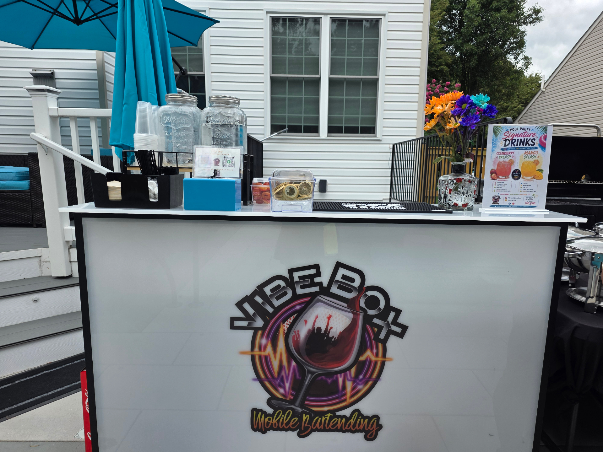 Vibe Box Mobile Bartending portable bar set up at a pool party